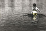 Girl Wading in River