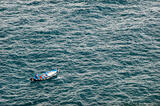 Fisherman Heading Out to Sea