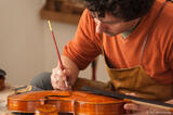 Violin Maker with Brush