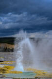Erupting Geyser and Clouds