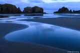 Curve of Blue Water on Beach