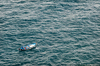 Fisherman Heading Out to Sea