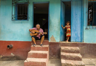 Man and Girl in Doorway